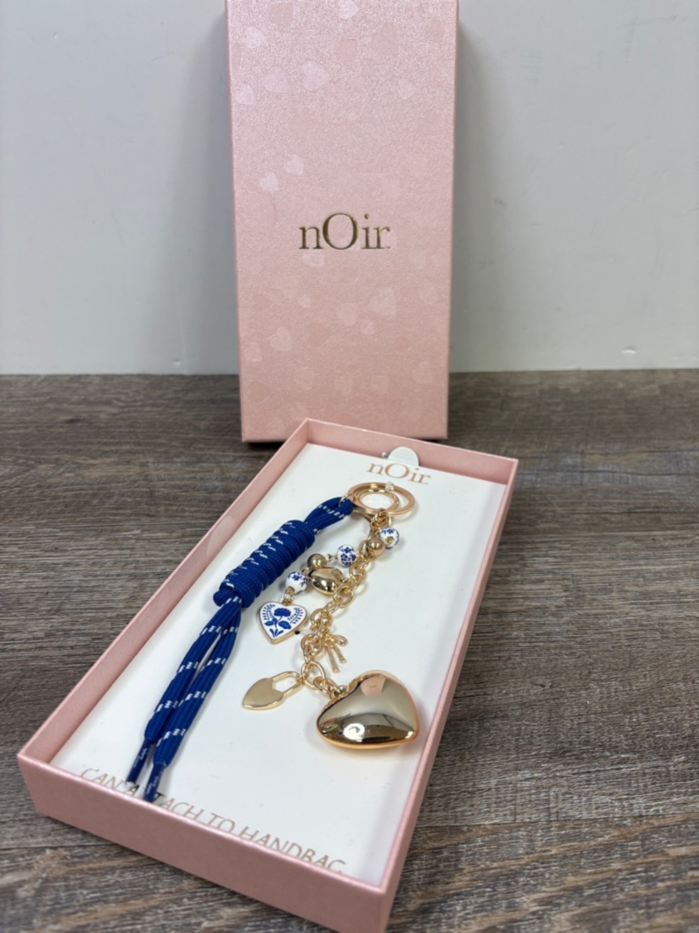 nOir Charm Handbag Keychain | Gold Tone Heart & Blue Porcelain-Inspired Accents
